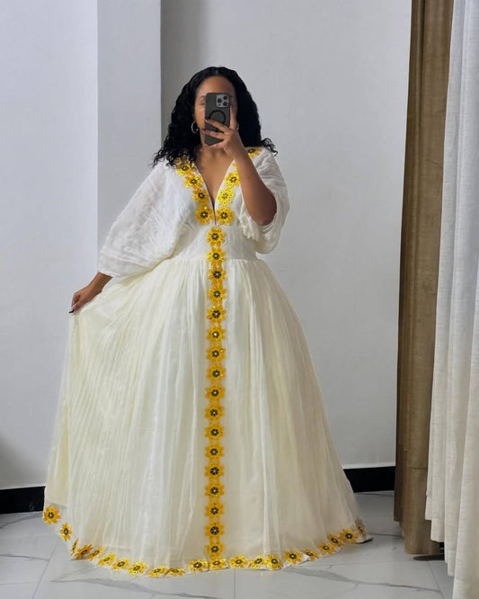 Elegant White Habesha Dress with Yellow Floral Embroidery