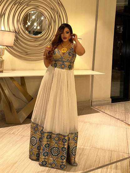 Elegant Sleeveless Habesha Kemis with Blue and Gold Woven Traditional Pattern Design