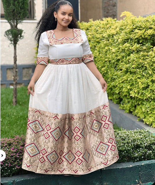 Elegant Habesha Kemis with Geometric Woven Patterns and Timeless Cultural Design