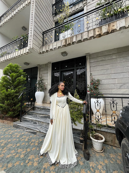 Modern White Ethiopian Dress with Black Embroidered Details