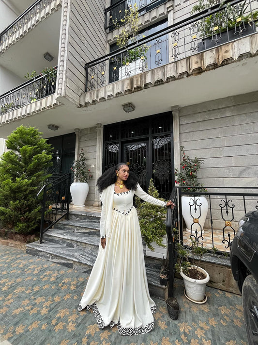 Modern White Ethiopian Dress with Black Embroidered Details