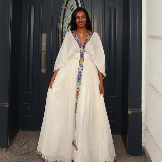 White Habesha Kemis with Colorful Tilet – Ethiopian & Eritrean Dress
