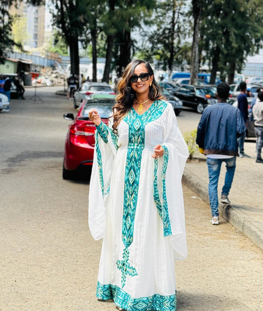 Vibrant Long Sleeve Habesha Dress with Colorful Woven Details 
