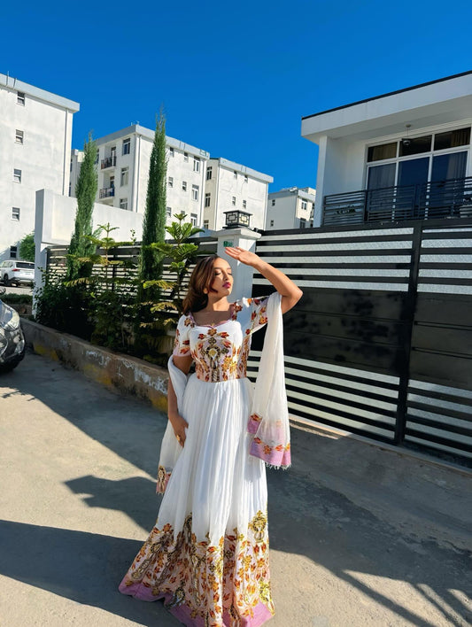 Traditional Ethiopian Kemis with Pink Accent and Gold Detail