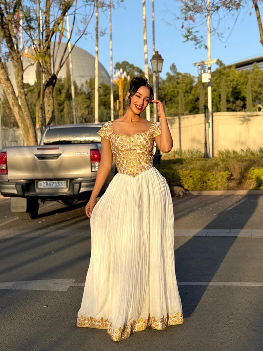 Elegant Traditional Ethiopian Dress with Golden Embroidery