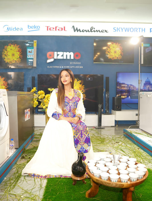 white embroidered ethiopian traditional dress made from habesha cloth