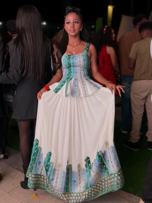 Elegant Sleeveless Habesha Kemis with Woven Green Details