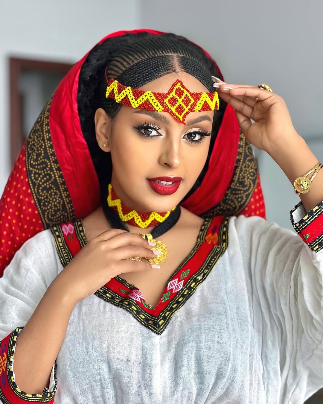 Elegant Ashenda Kemis with Bold Red and Yellow Accents – Eritrean Dress