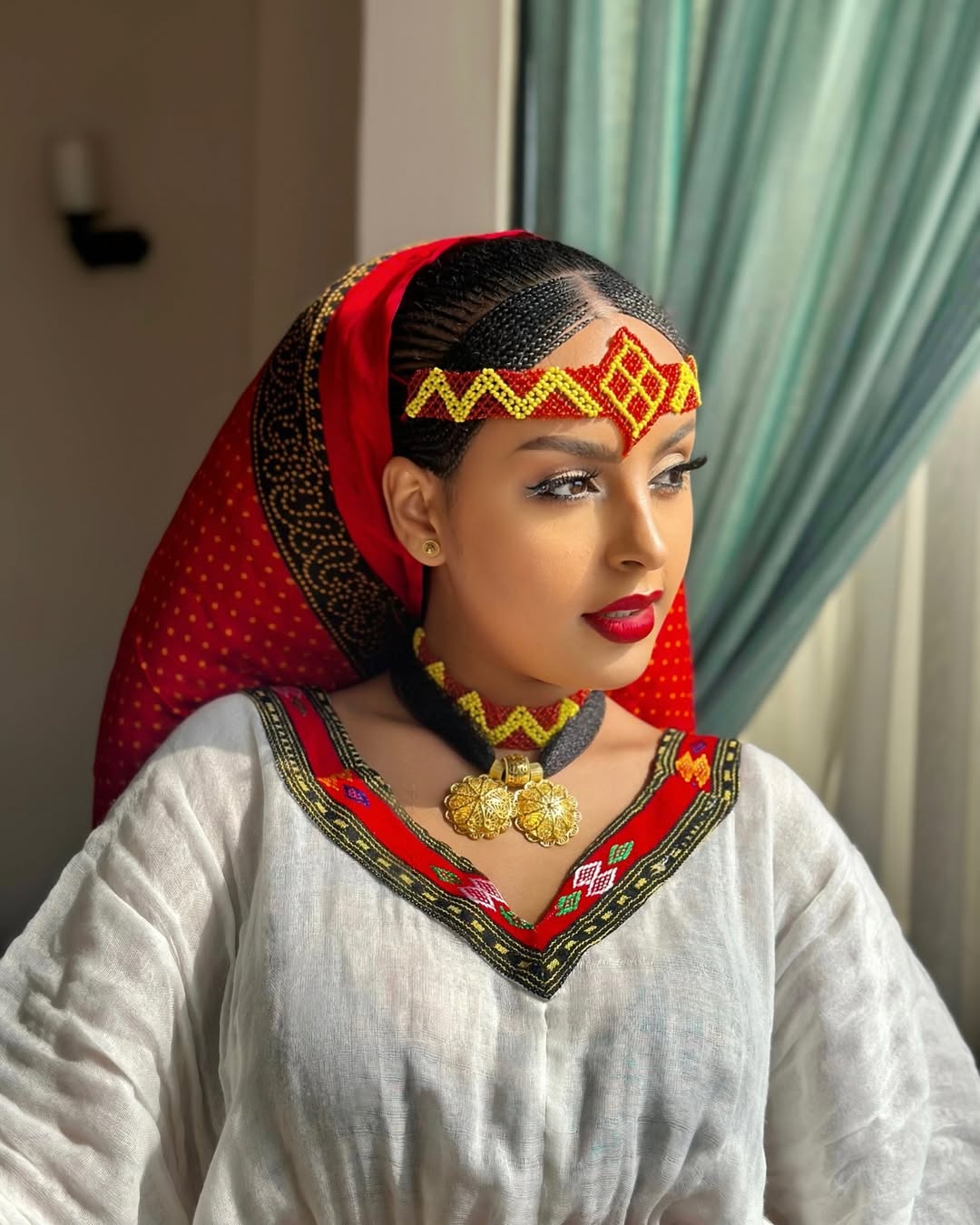 Elegant Ashenda Kemis with Bold Red and Yellow Accents – Eritrean Dress