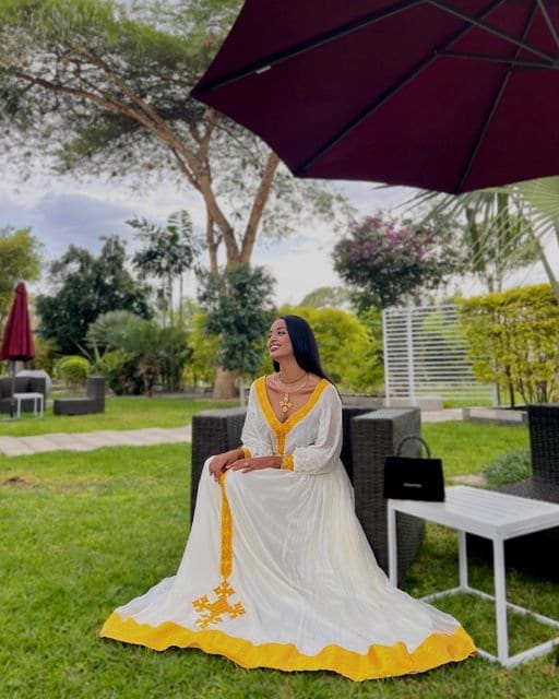 A Vibrant Yellow Tilf Habesha Dress