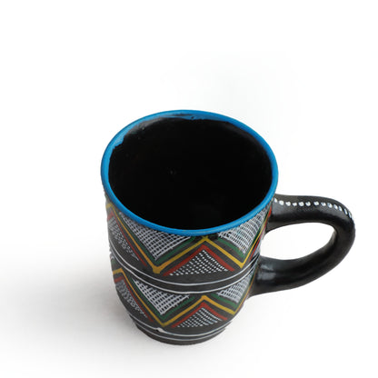 Handmade and hand painted mug with Ethiopian patterns