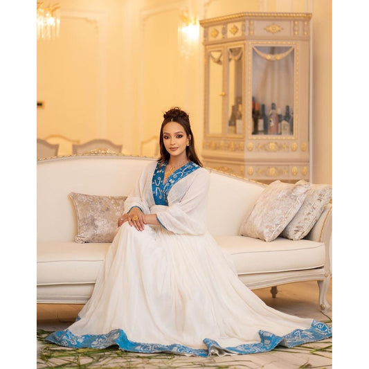 Blue habesha kemis sitting view
