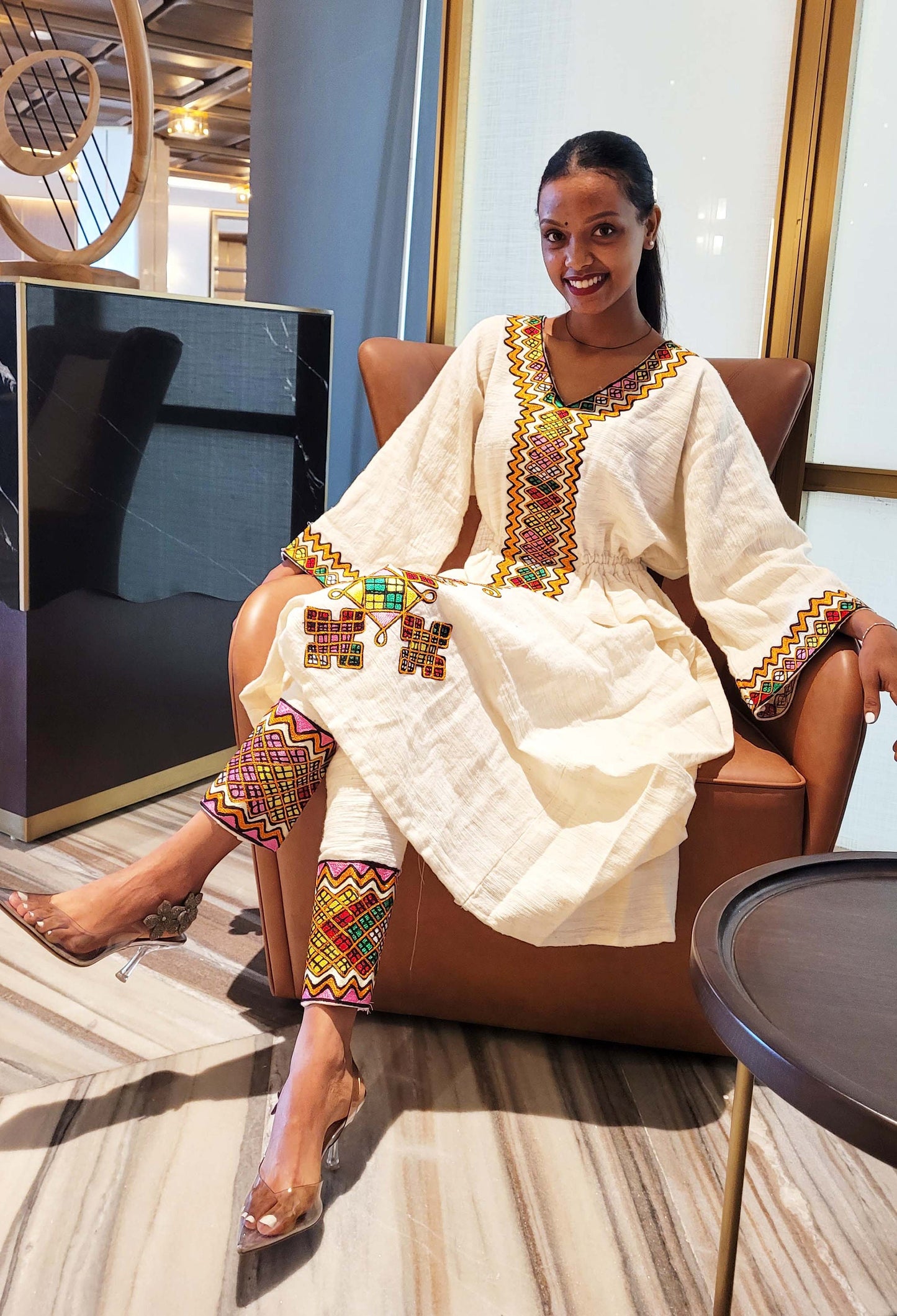 Vibrant Elegance: Pink and Orange Embroidered Habesha Dress – Celebrate Ethiopian & Eritrean Culture with this Stunning Masterpiece